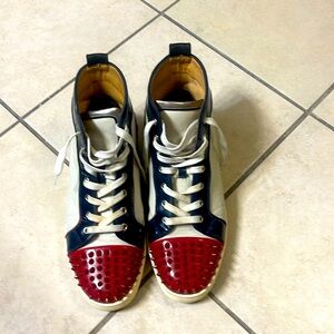 First iconic Christian Louboutin red bottom tennis shoes size 12.5 no box no tag